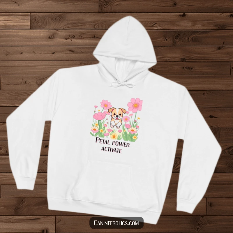 Funny hoodie showcasing a happy dog puppy leaping with abandon through a surreal field of oversized, colorful flowers, a symbol of pure joy.